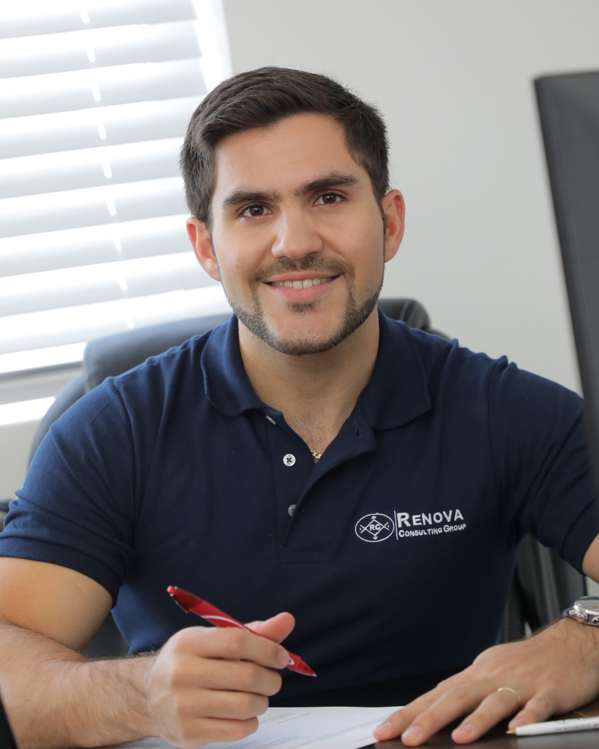Image of man with red pen